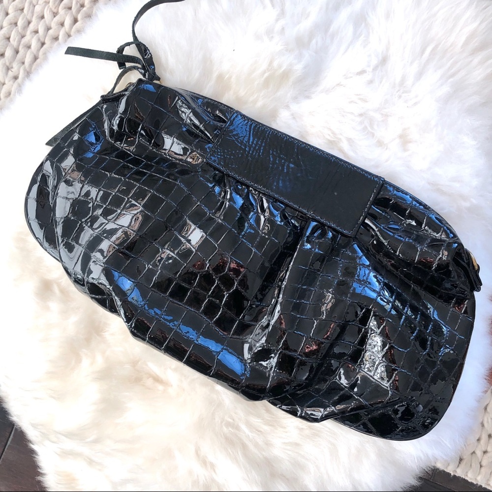 Bryna Nicole black patent leather clutch bag